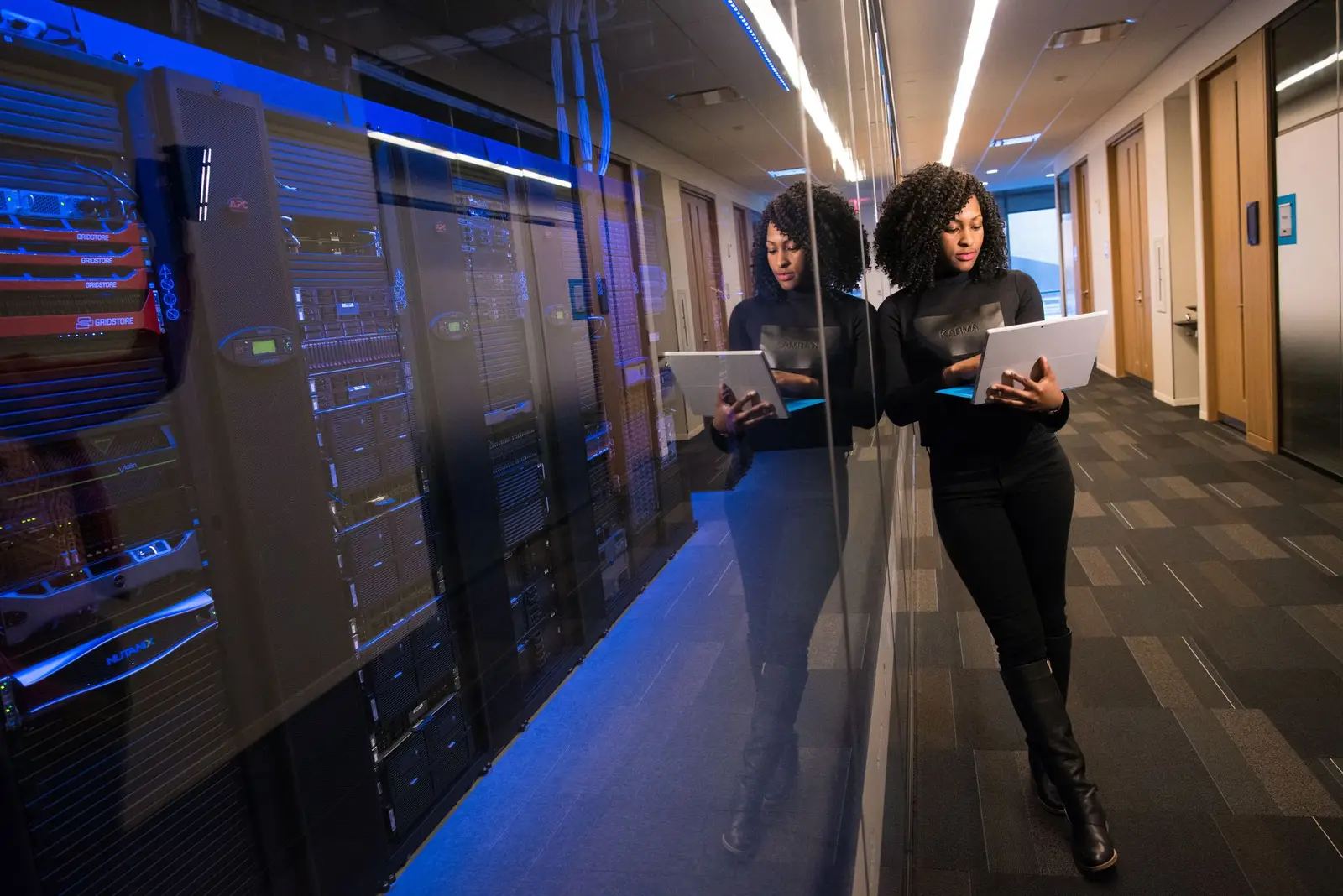 IT team walking through a secure data centre