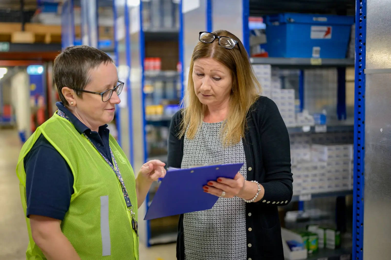 Supplier audit discussion in a warehouse
